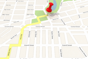A map displaying a red pin marking a street, relevant for long distance moving companies.