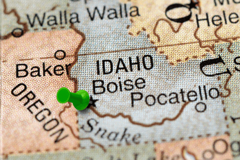 An image of a map with a green pin marking Boise, highlighting that moving to Boise is a desirable choice for new residents.