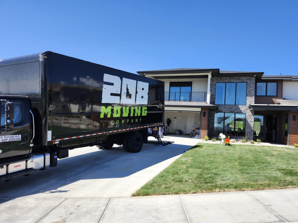208 Moving Company truck parked at a residential home in Boise, Idaho during a local move