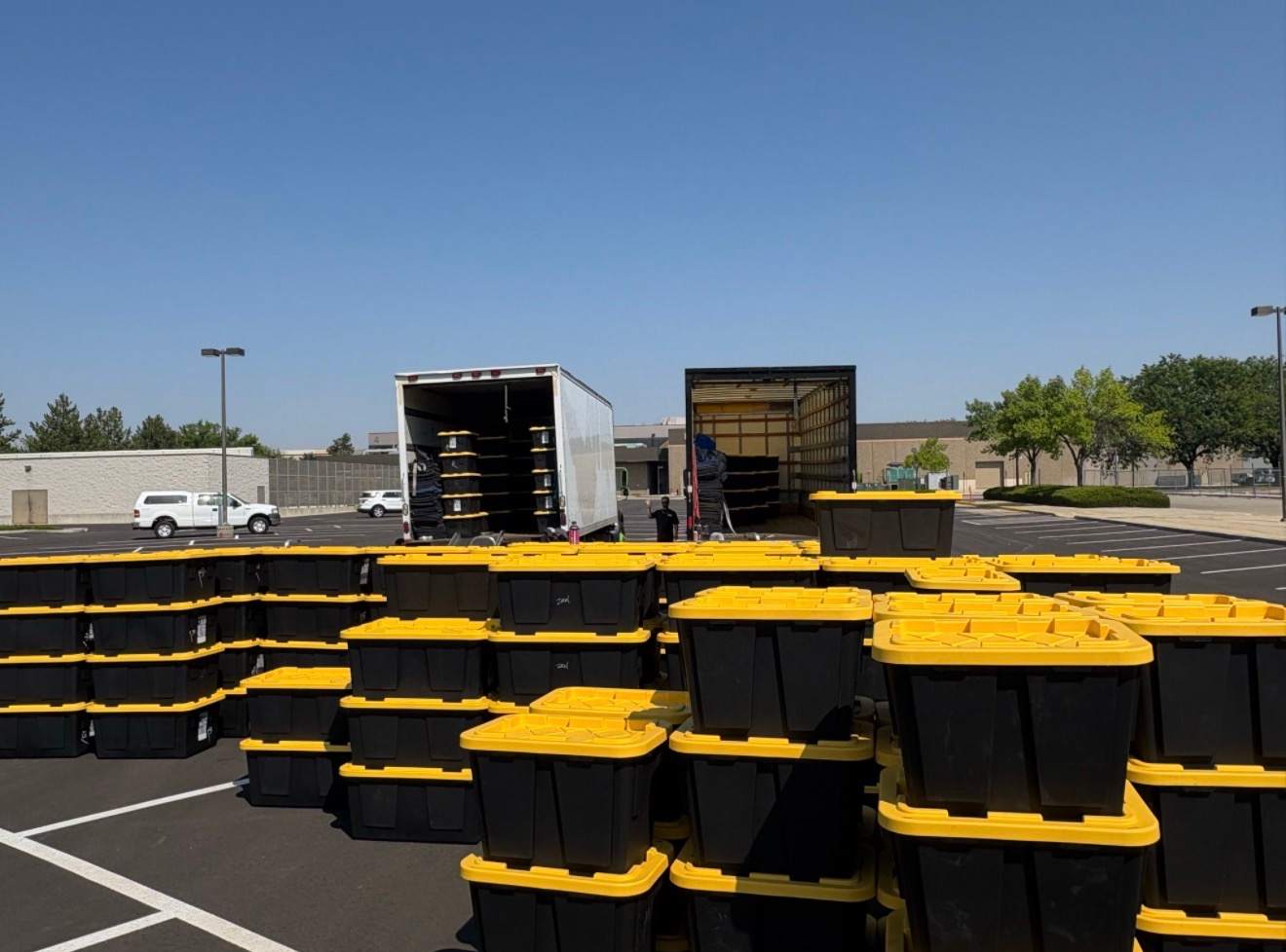 208 Moving Company Unloading Bins at Commercial Site